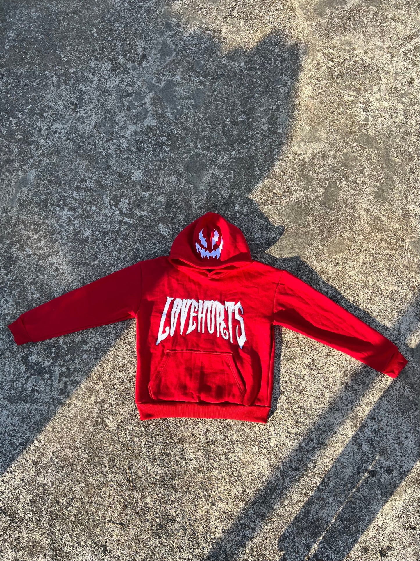 RED LOVEHURTS HOODIE