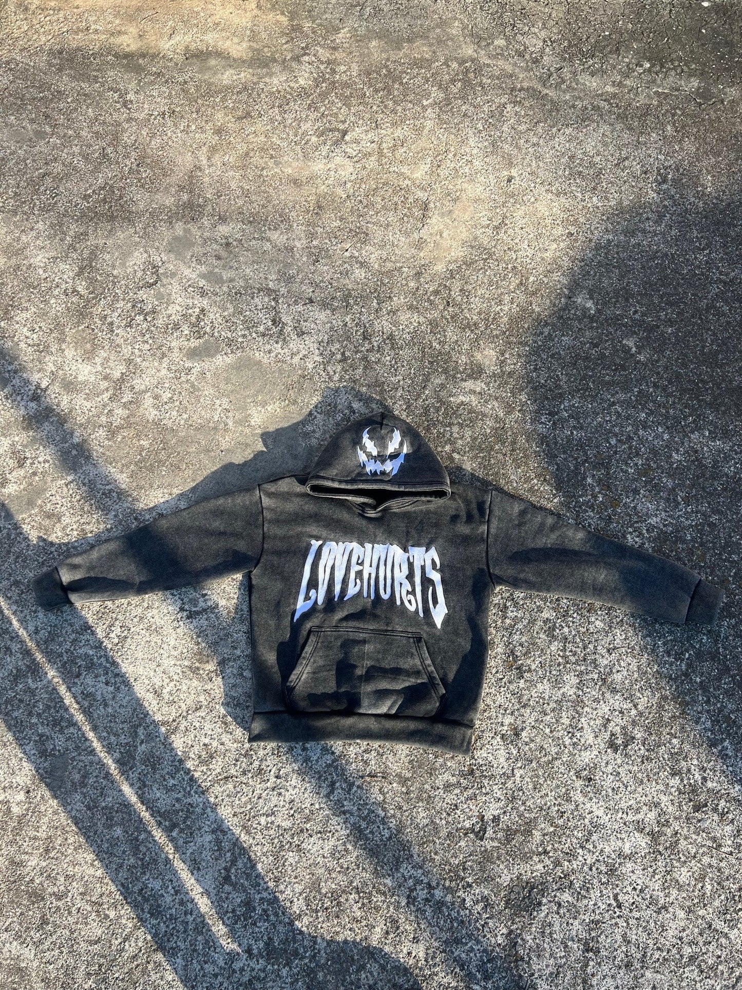 BLACK ACID WASH LOVEHURTS HOODIE