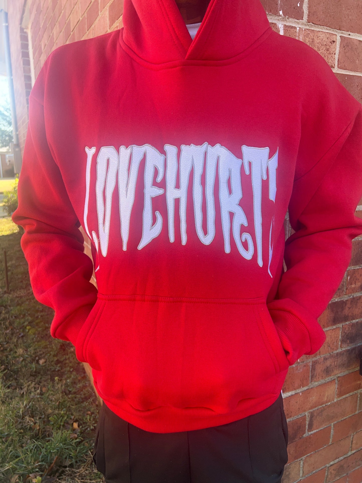 RED LOVEHURTS HOODIE